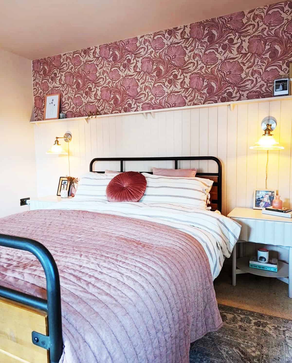 vintage dark pink floral wallpaper above white tongue-and-groove panelling in a bedroom pink wallpaper ideas home decor
