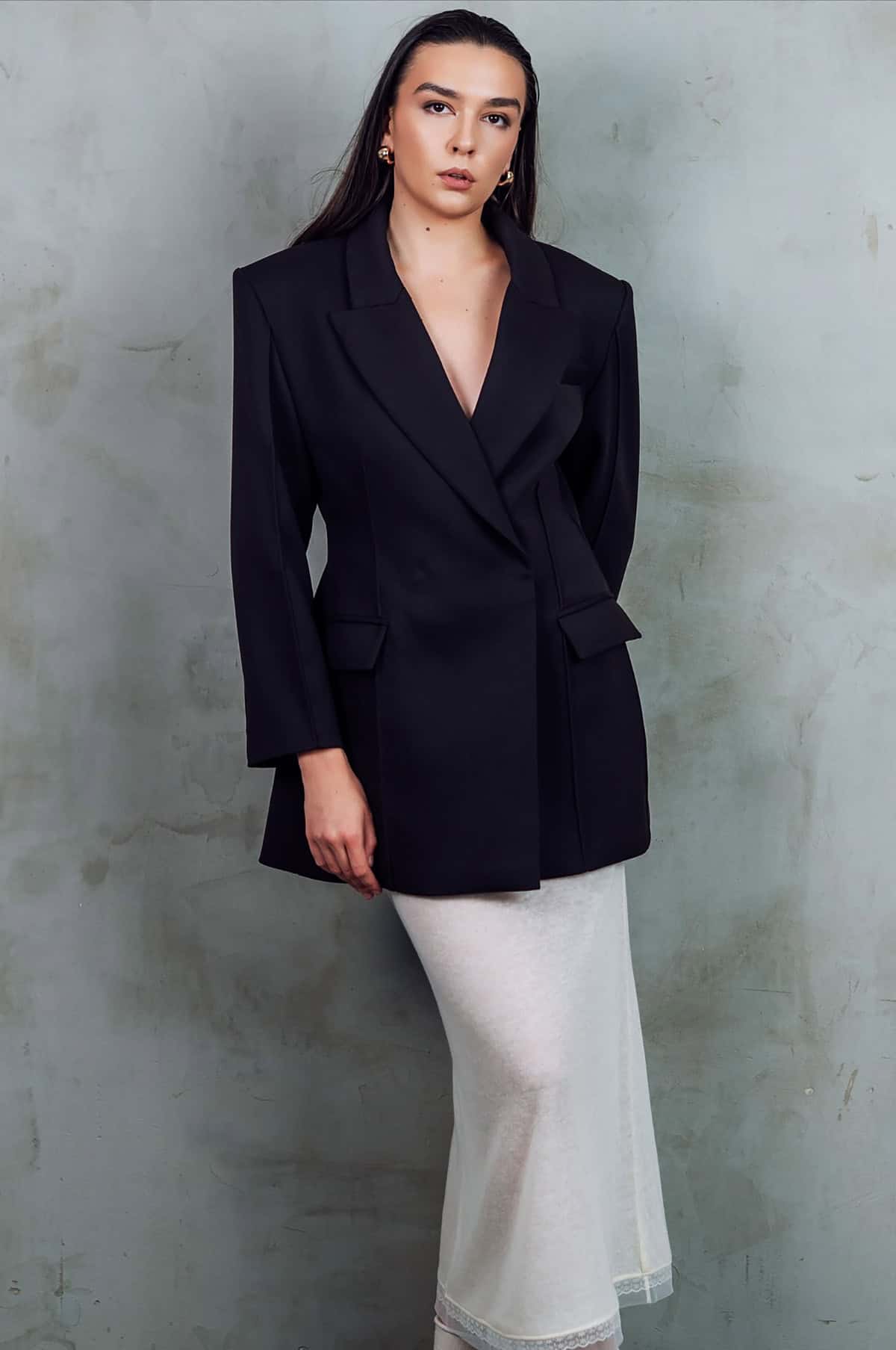 black blazer cream skirt office attire for corporate women