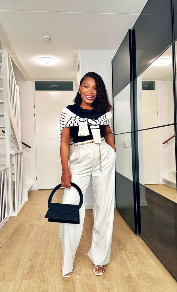 cream wide-leg trousers with fitted knit summer office look