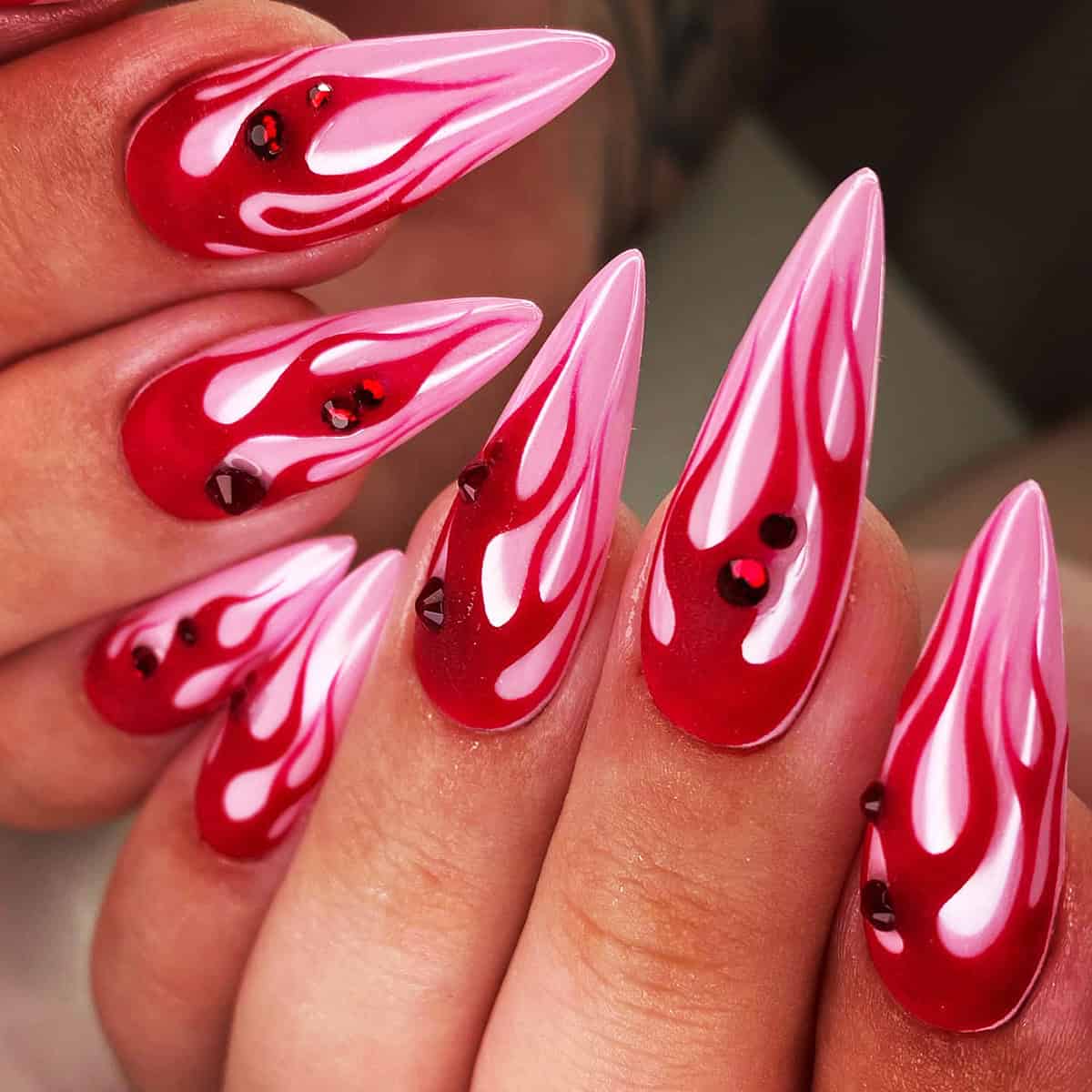 red pink gem flame nails