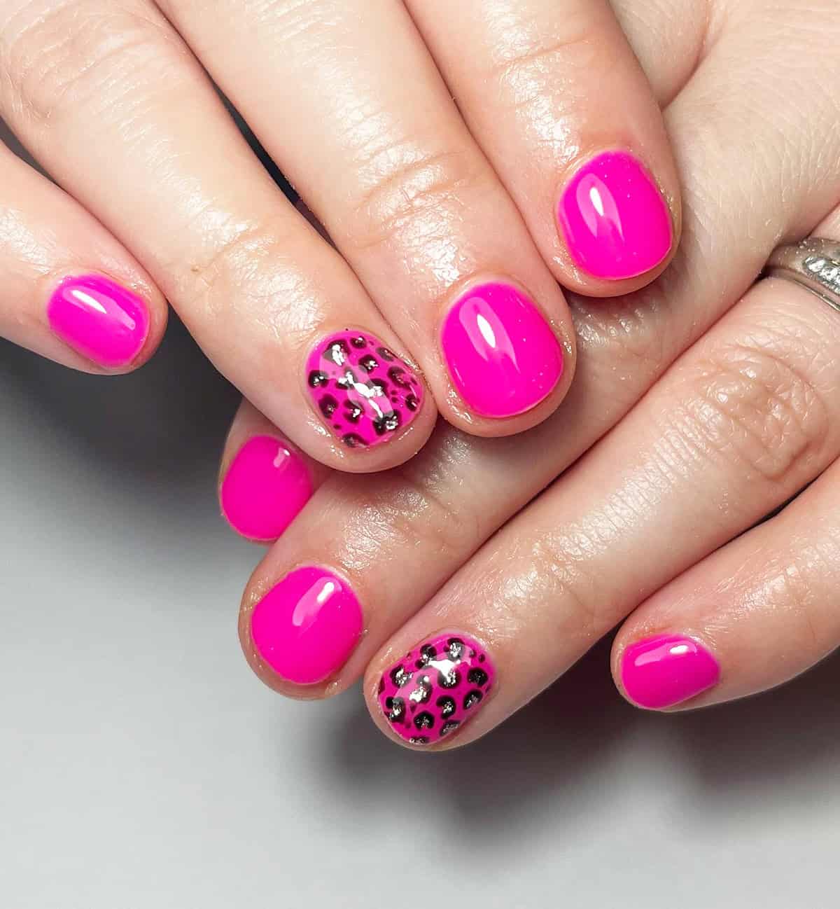 neon pink silver glitter short leopard print nails