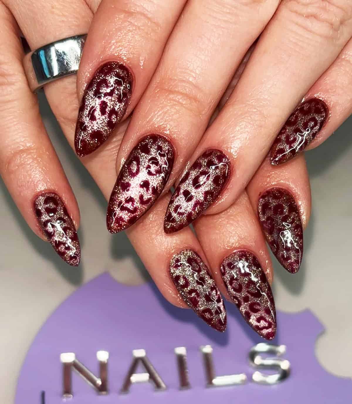 burgundy silver foil cheetah stiletto cheetah print nails