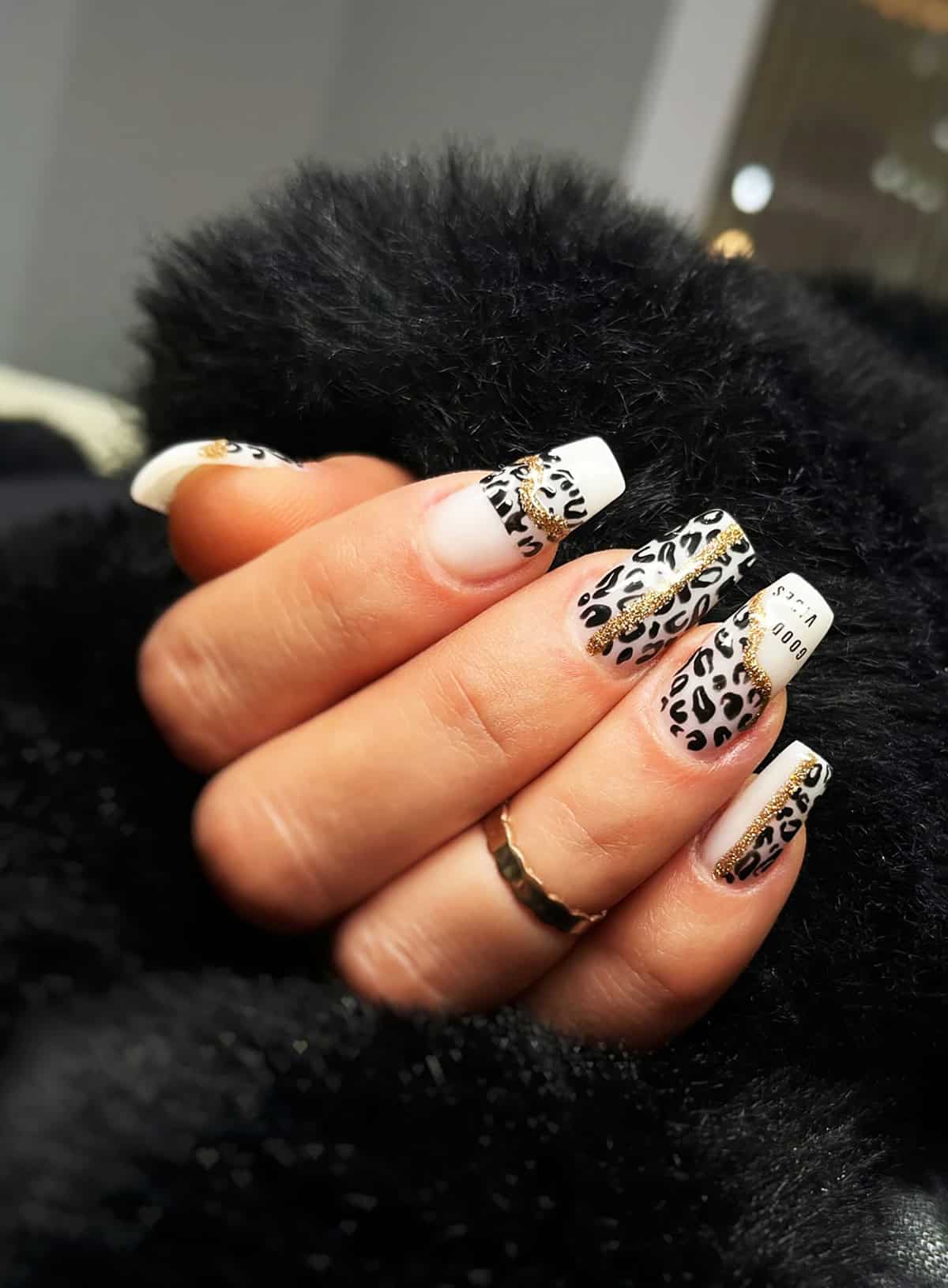 white coffin gold drip black leopard print nails