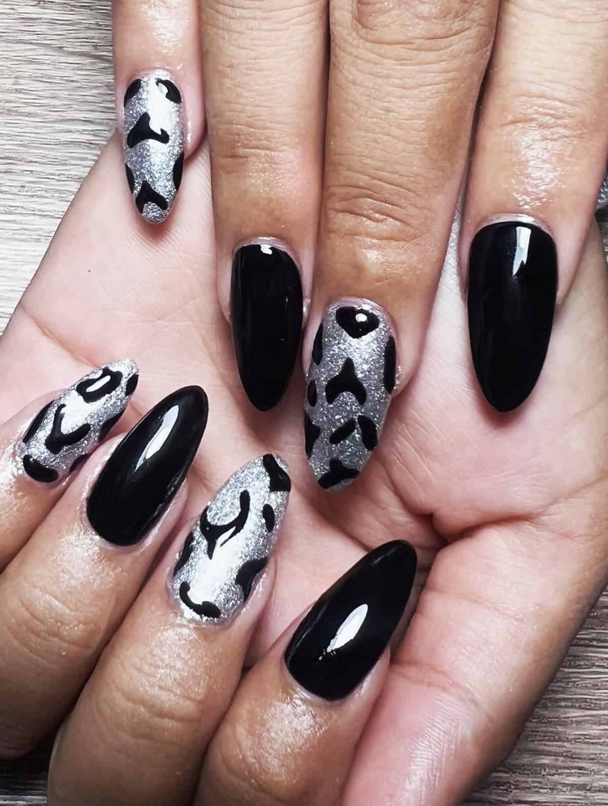 silver glitter almond bold black leopard print nails