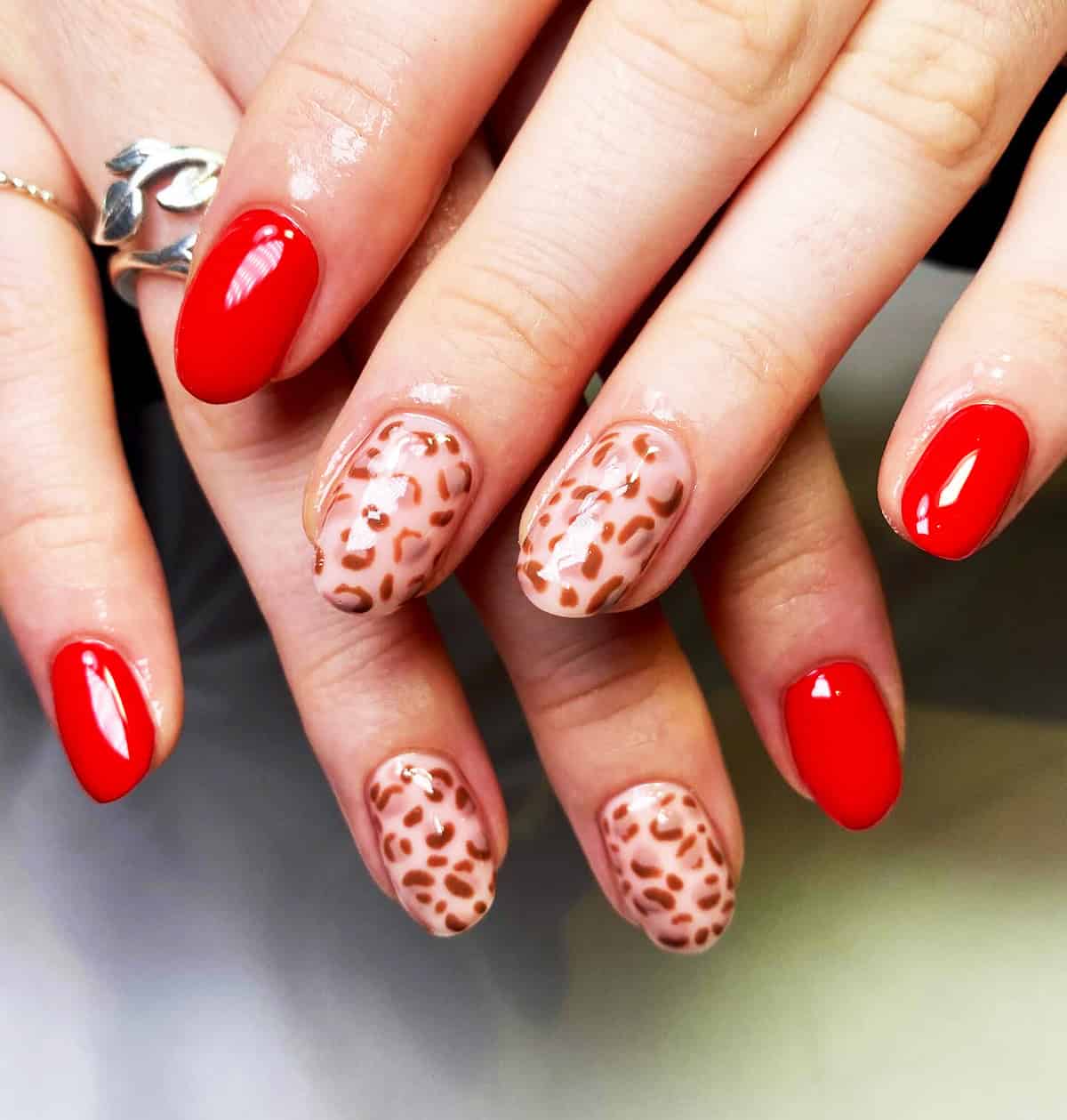 red solid nude print short leopard print nails