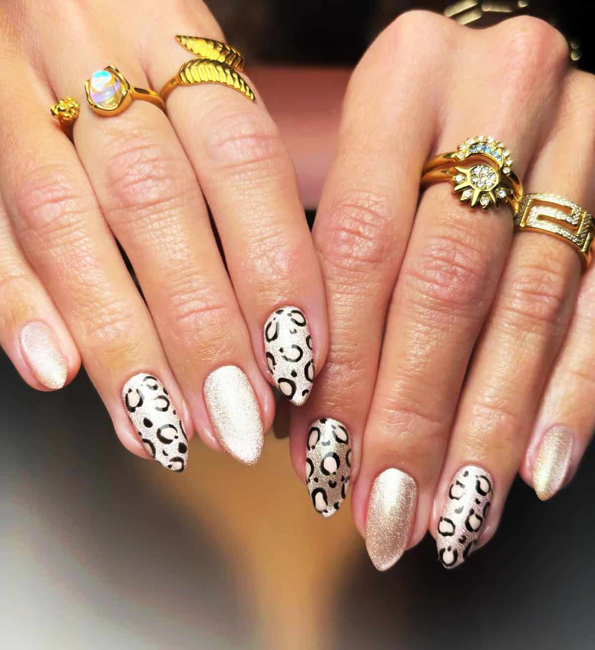 champagne shimmer almond cheetah print cheetah print nails