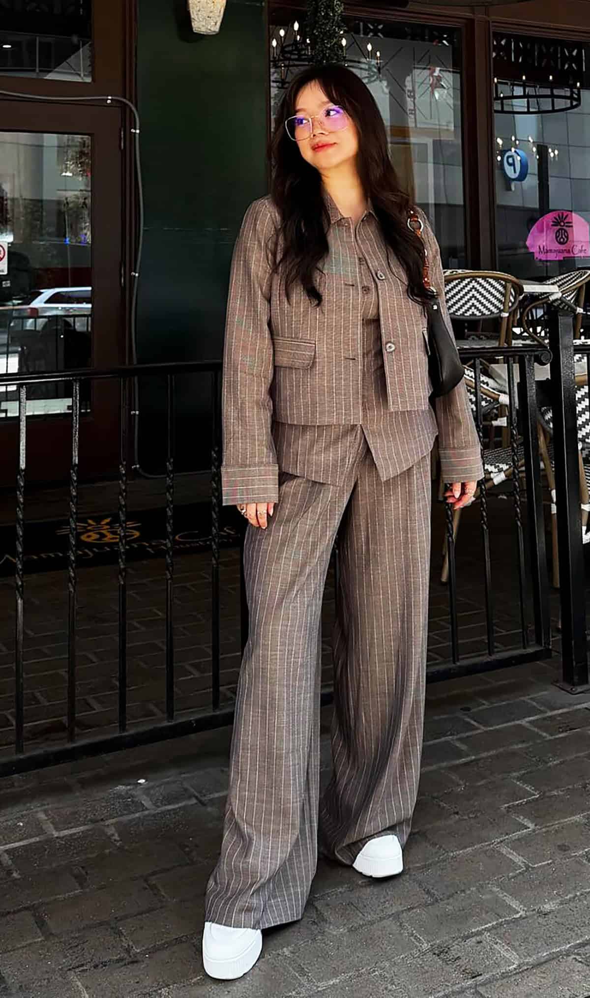 brown pinstripe wide leg suit office attire for corporate women