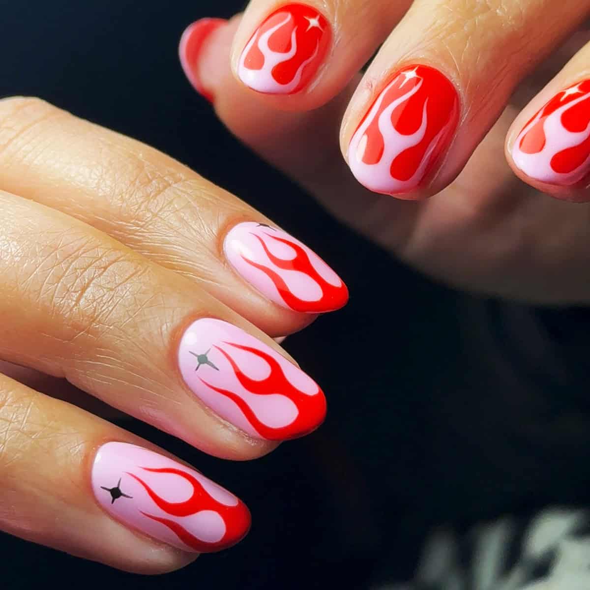 alternating pink red flame nails