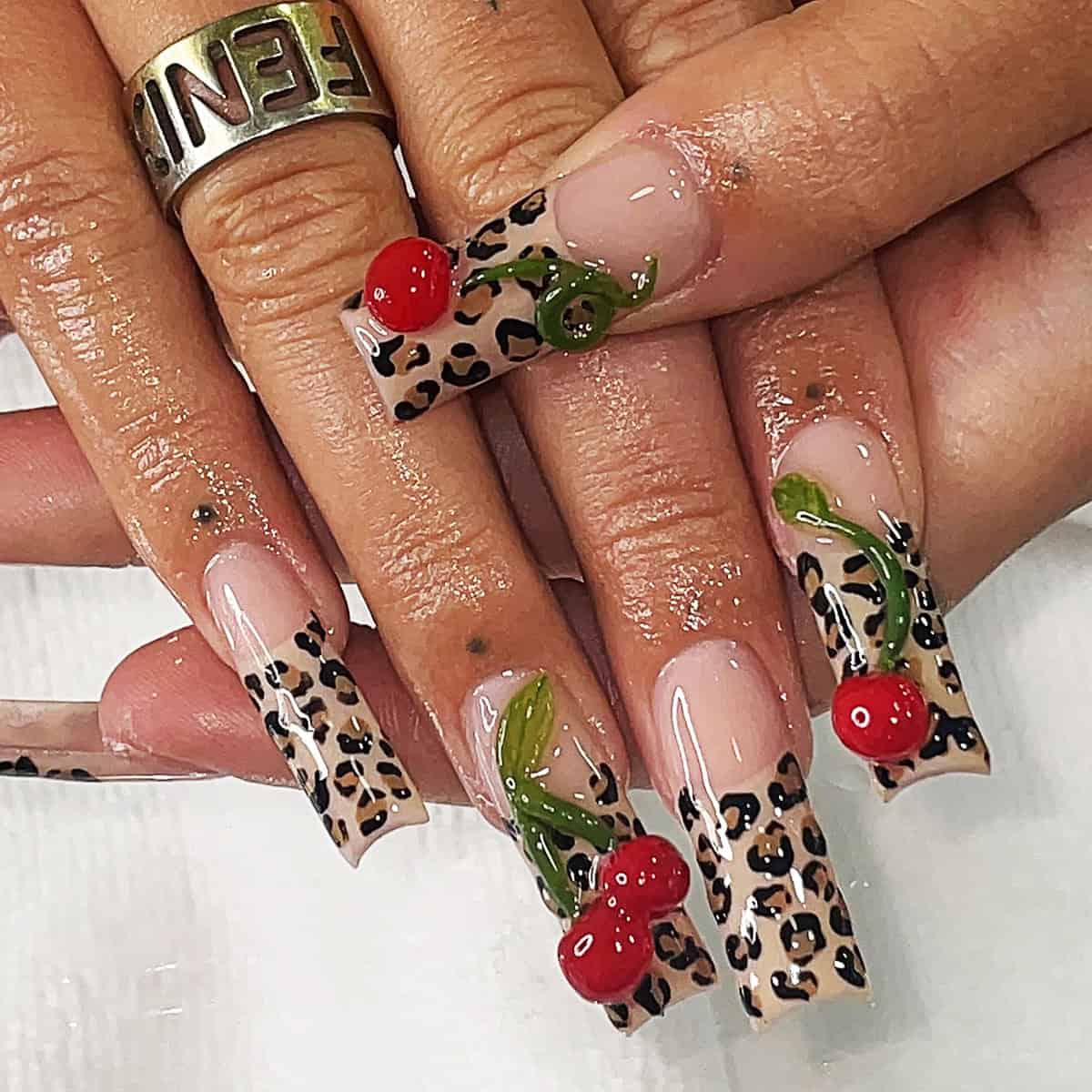 long square cheetah cherry accents cheetah print nails