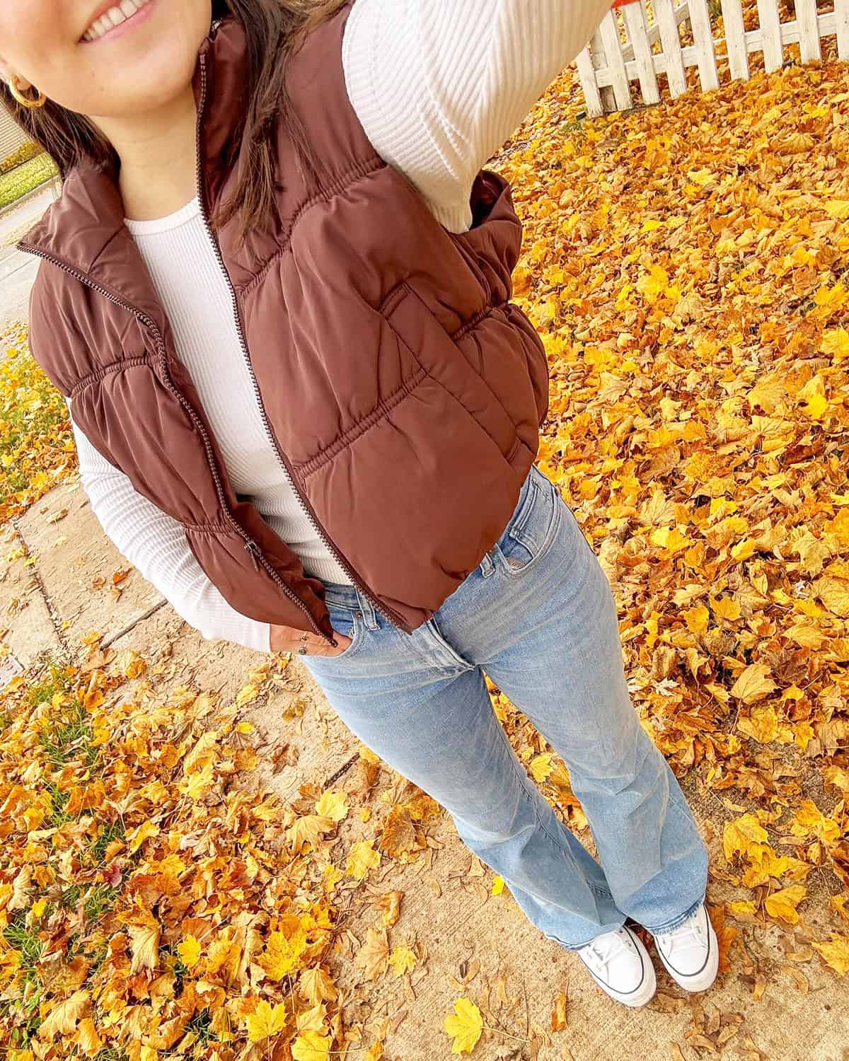 brown puffer vest light denim jeans and sweaters for fall
