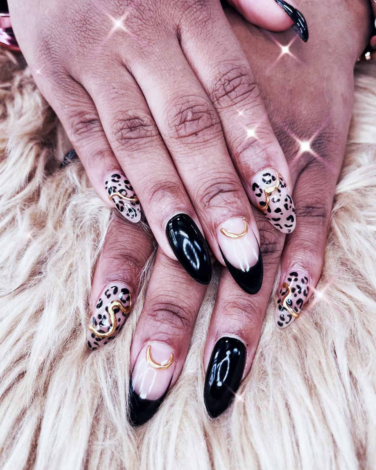 gold charm almond glam black leopard print nails