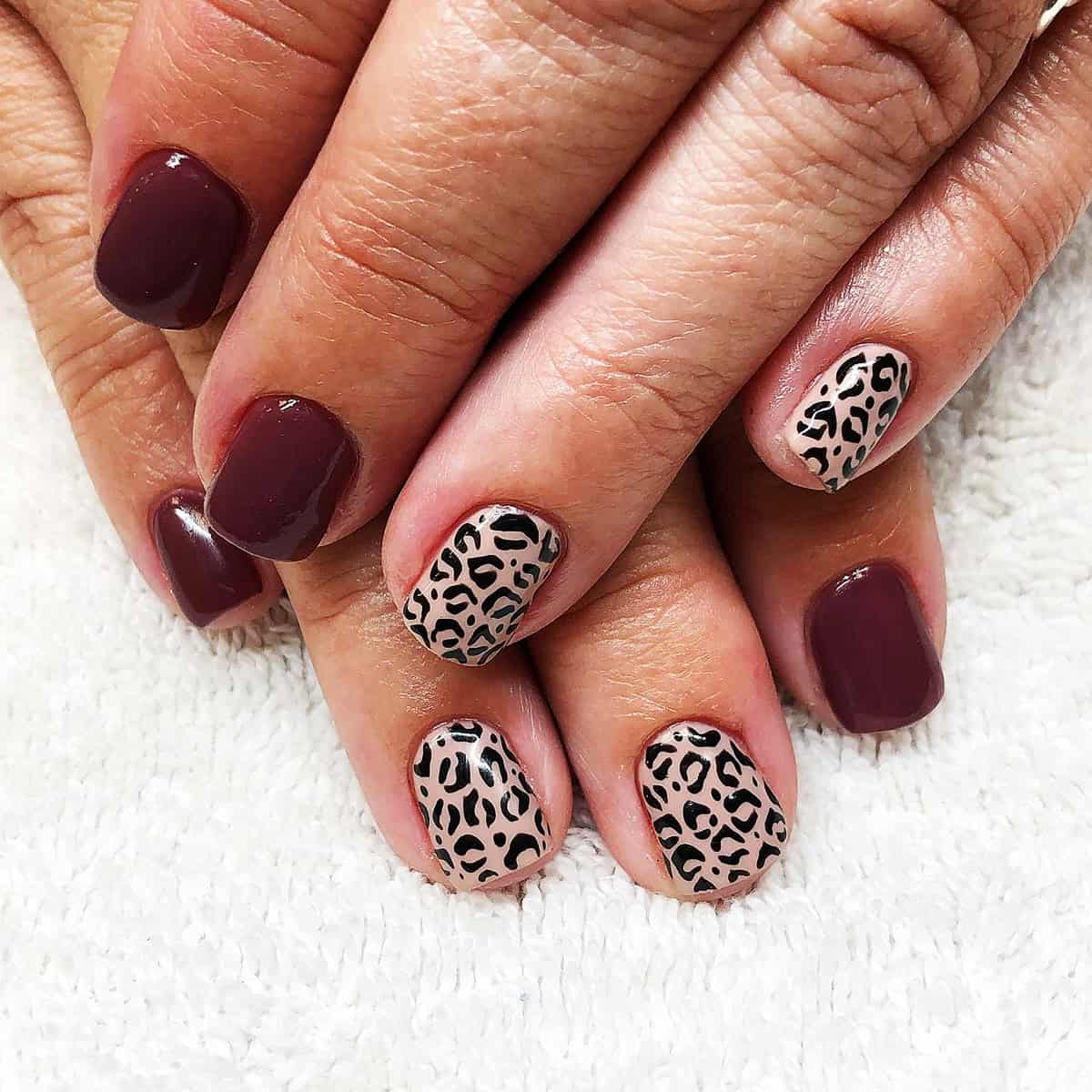 burgundy nude dense spots short leopard print nails