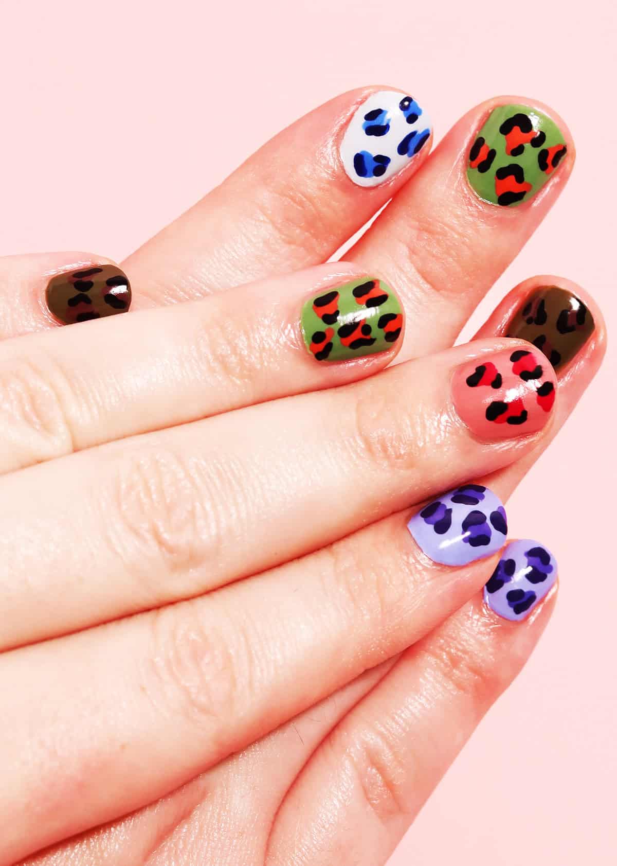 every nail different color short leopard print nails