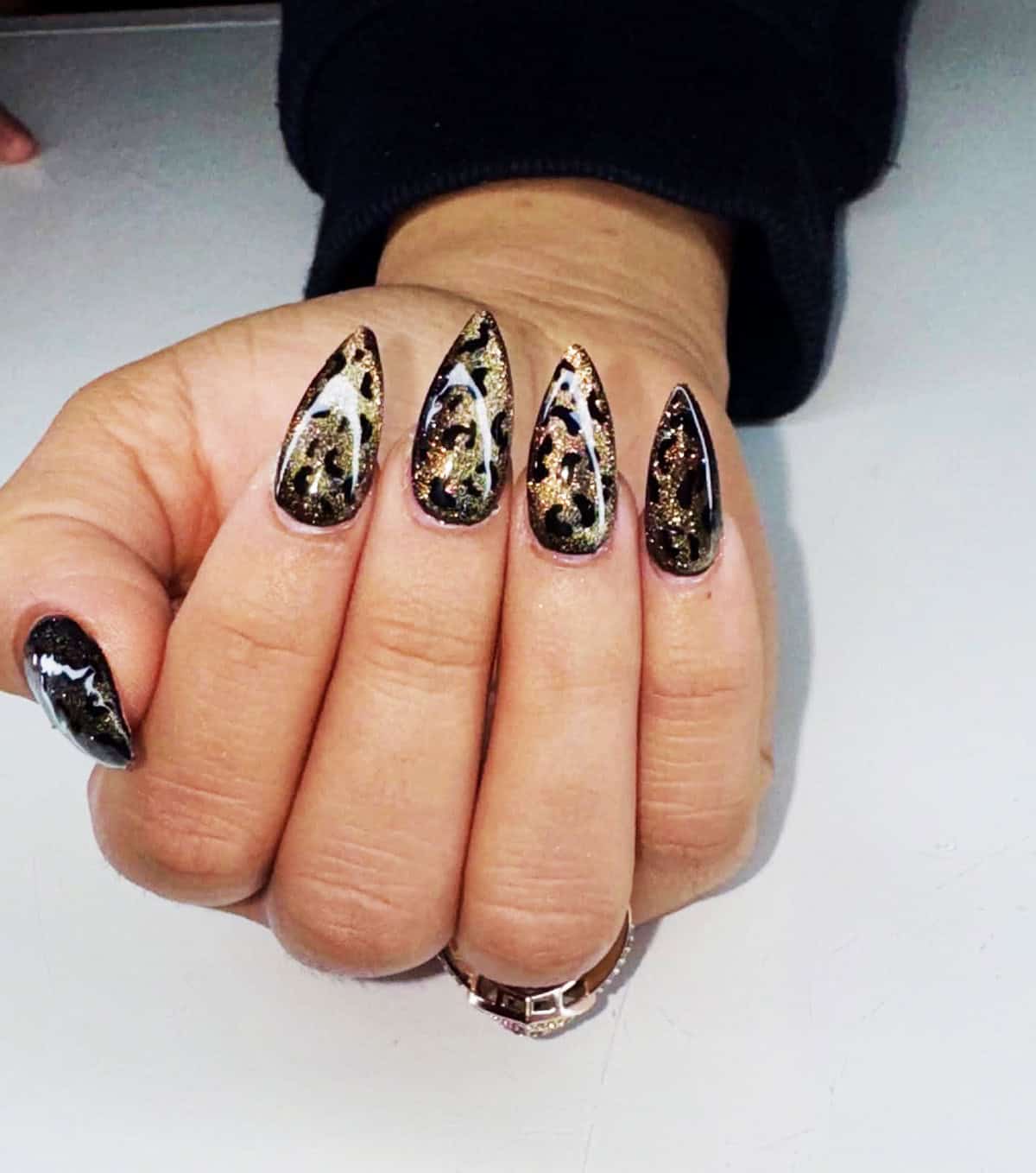 black gold glitter cheetah spots cheetah print nails