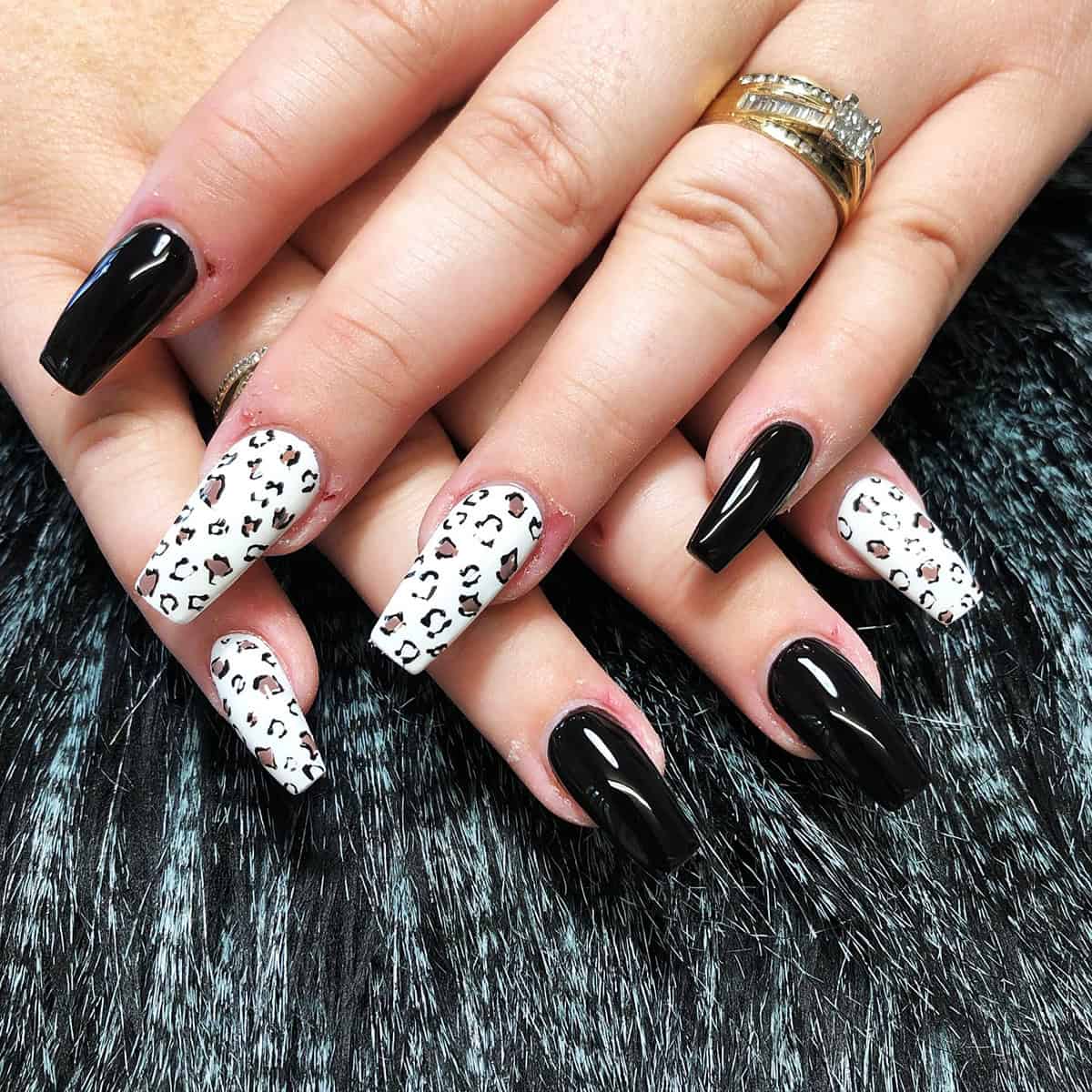 white coffin warm contrast black leopard print nails