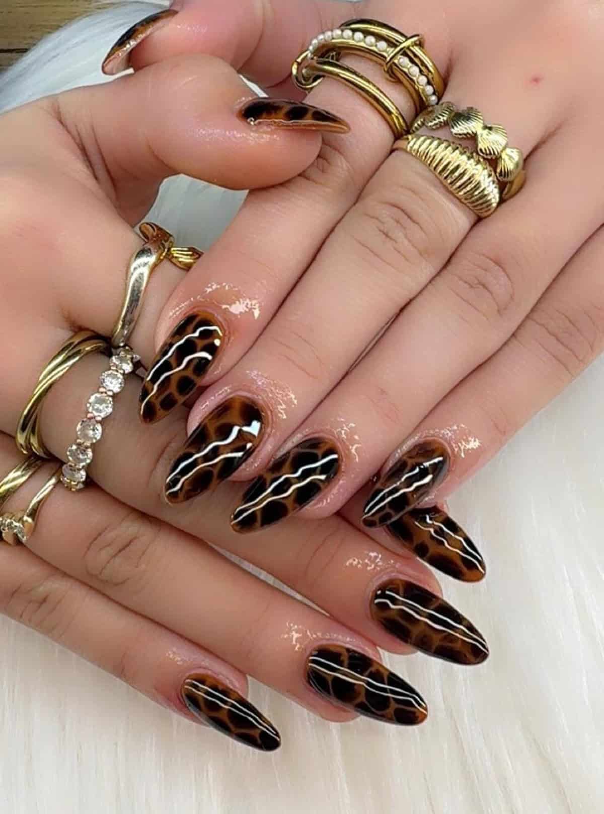 dark brown stiletto cheetah wavy lines cheetah print nails