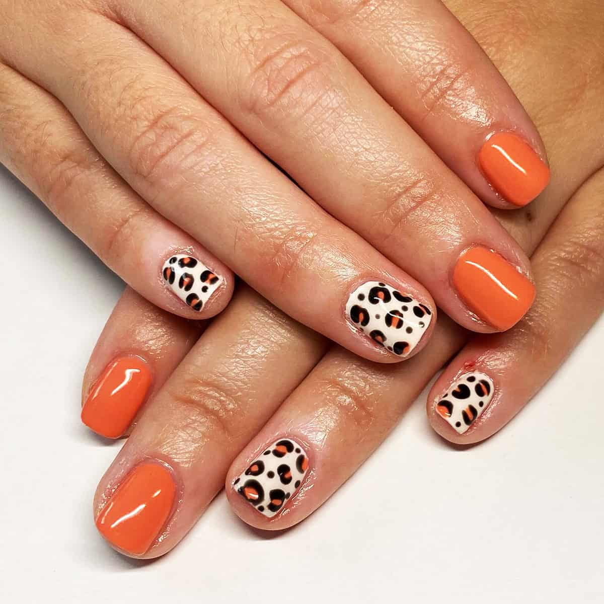 orange white matching spots short leopard print nails