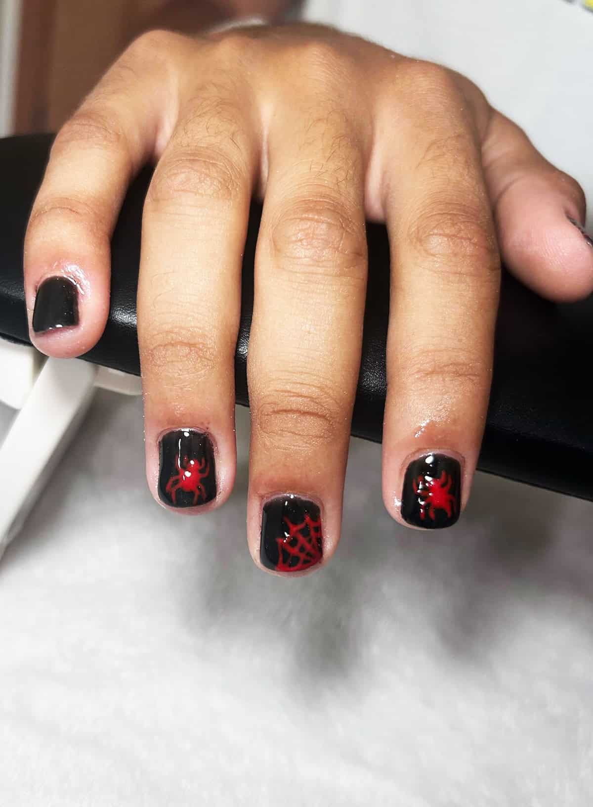 red spider black men's nails
