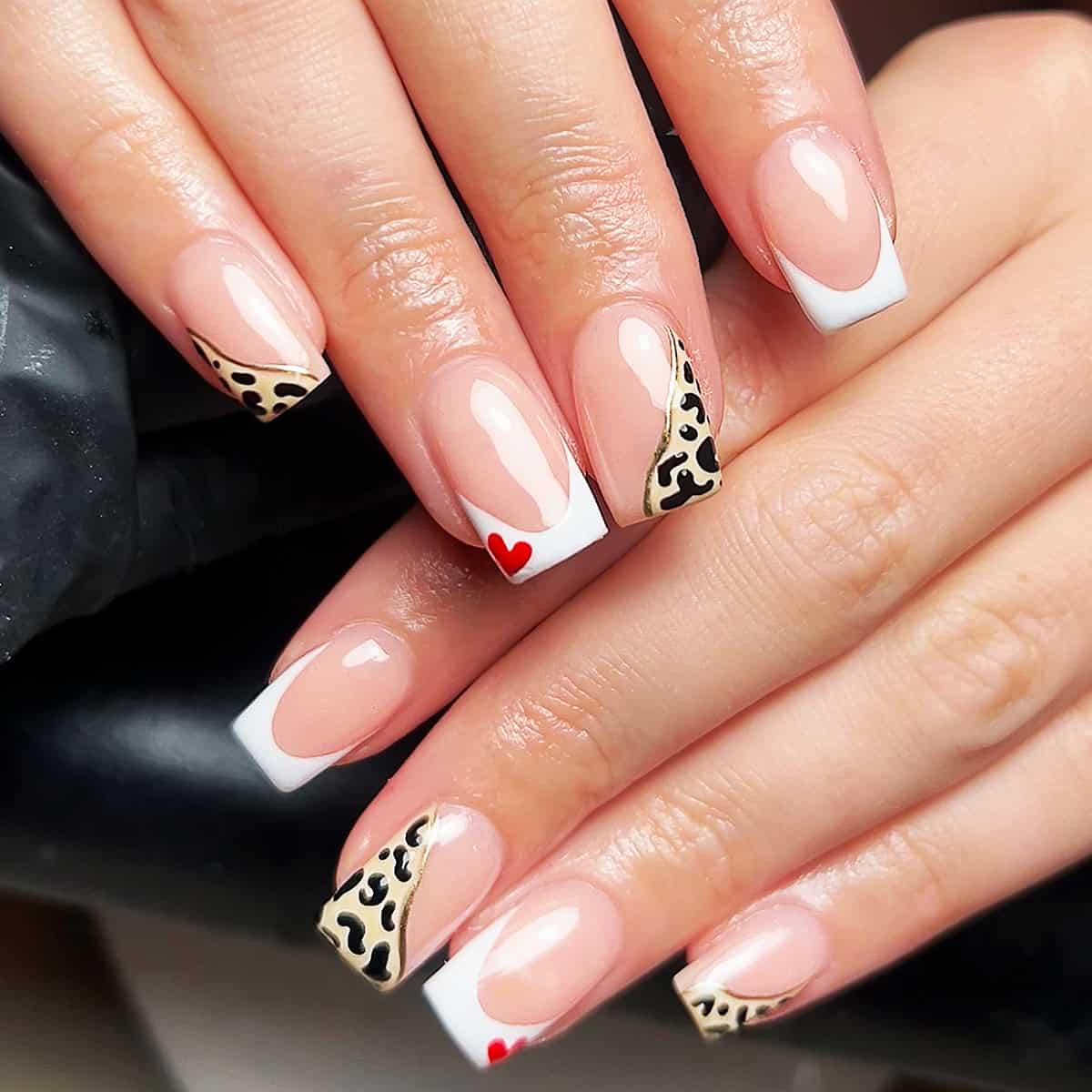 split tip heart detail short leopard print nails