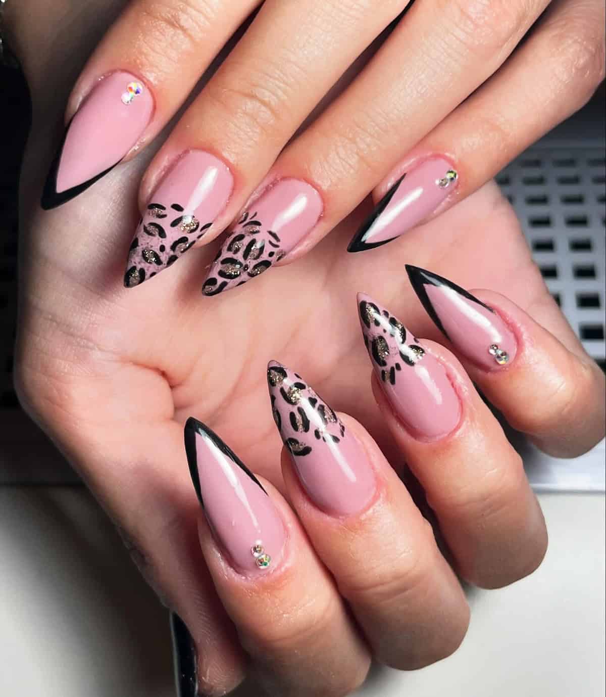 pink stiletto gold glitter black leopard print nails