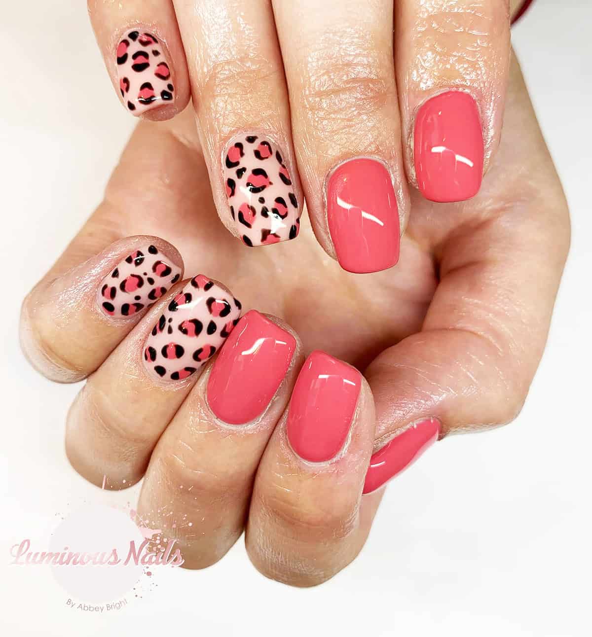 coral pink tonal spots short leopard print nails