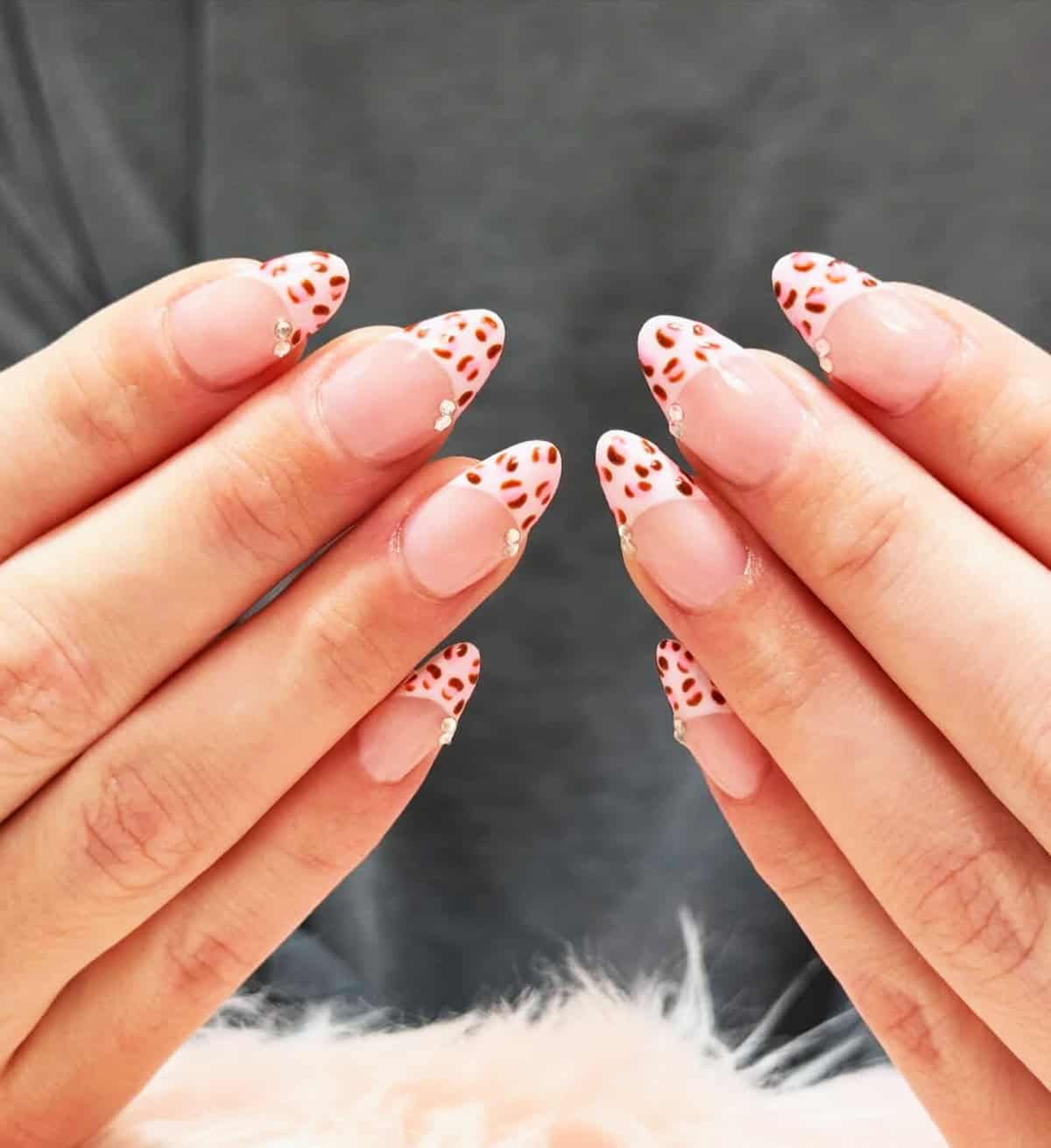 nude almond cheetah tips rhinestones cheetah print nails