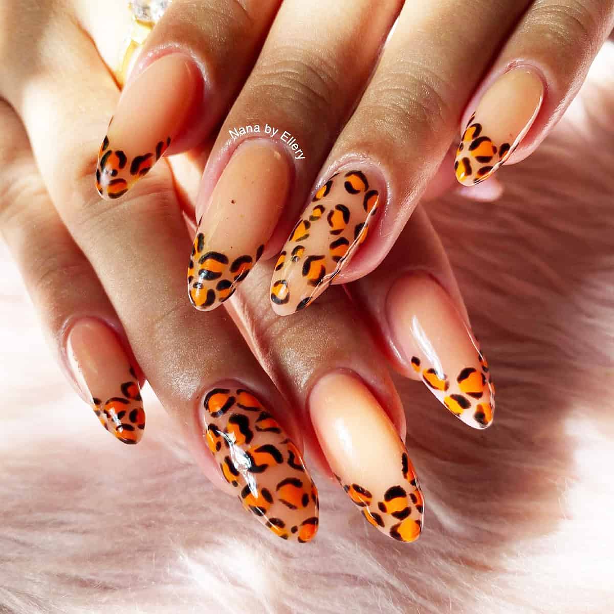peach orange leopard French tips fall leopard print nails