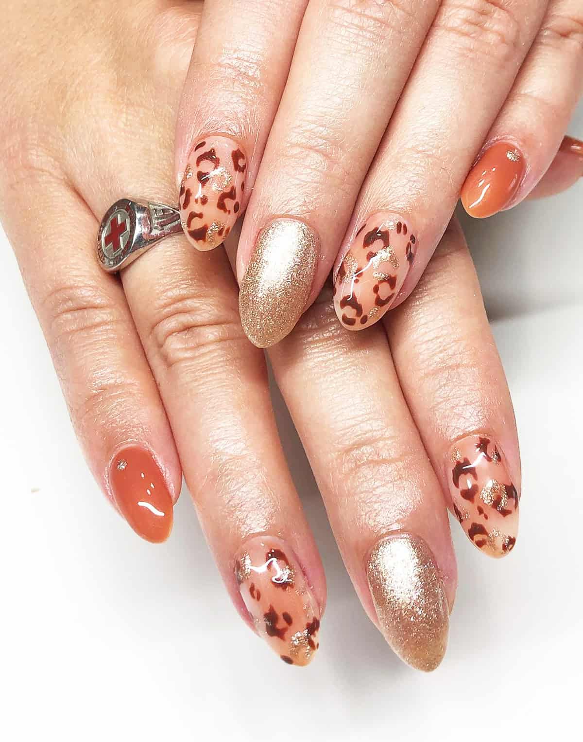 rust gold shimmer leopard nails fall leopard print nails