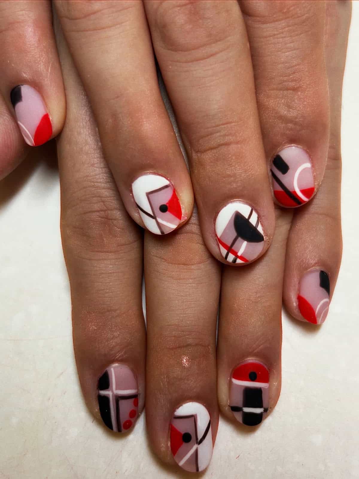 red black geometric men's nails