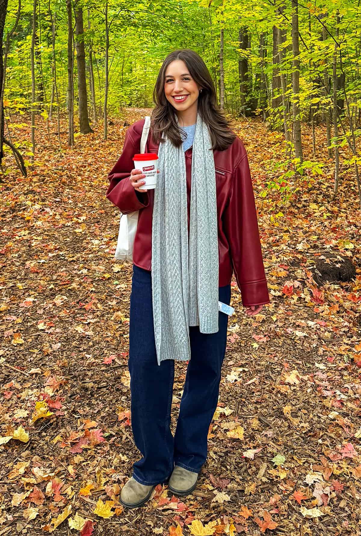 red leather jacket grey scarf jeans and sweaters for fall