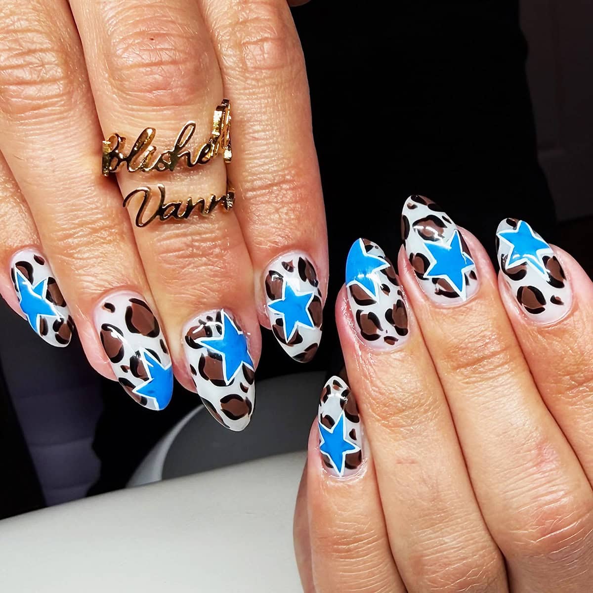 white cheetah blue star nails cheetah print nails