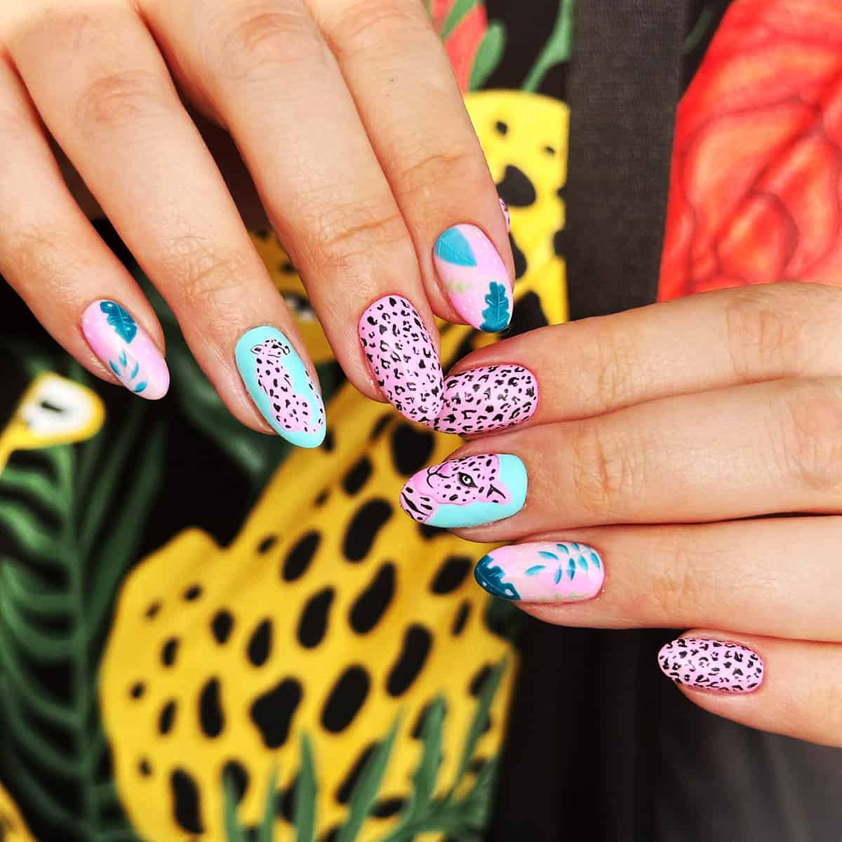 tropical leopard face pink leopard print nails