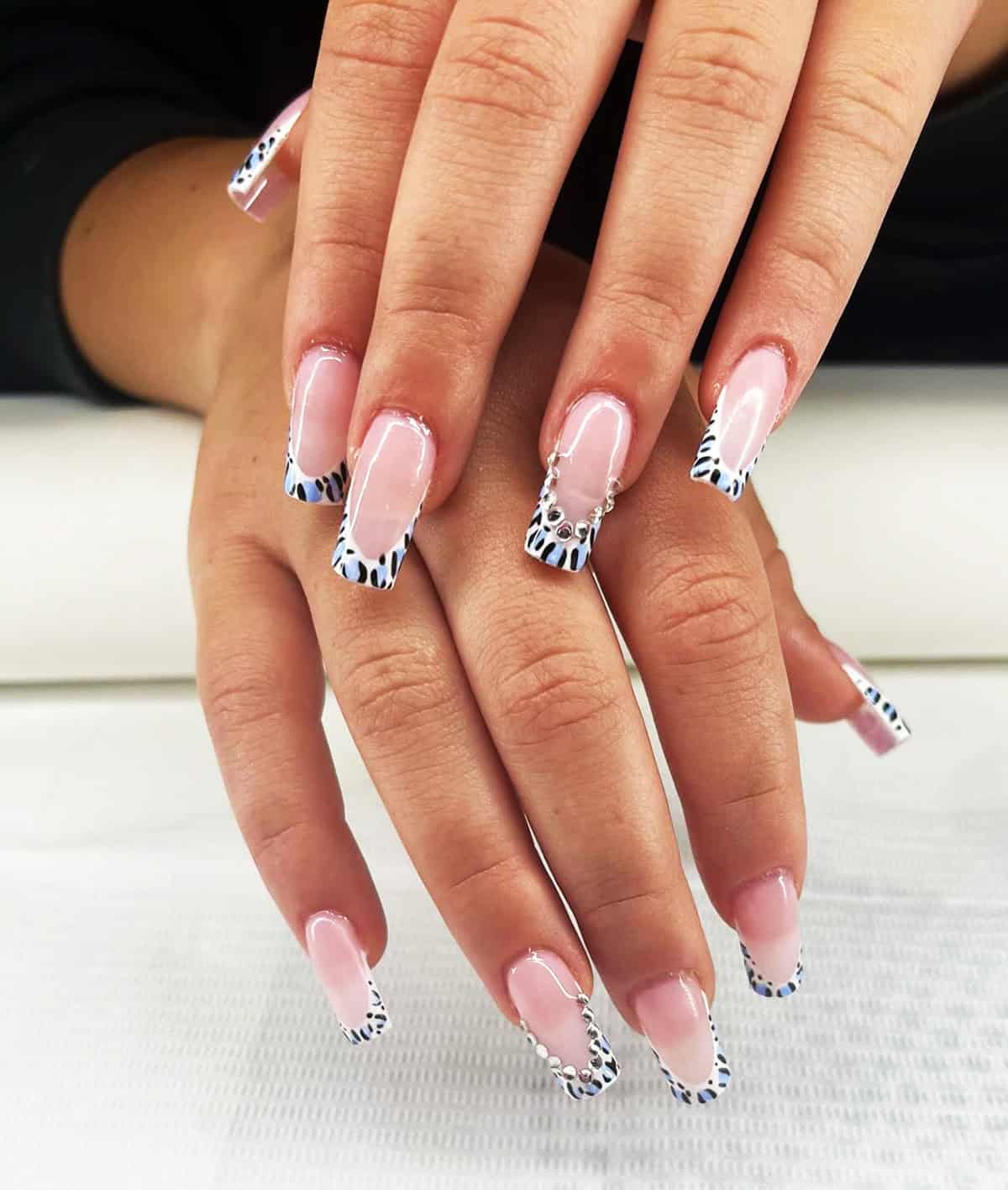 square cheetah tips blue rhinestones cheetah print nails