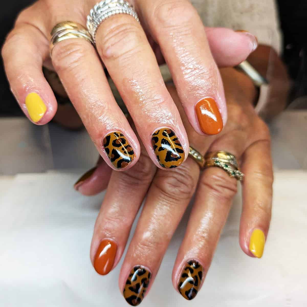 yellow orange caramel leopard nails fall leopard print nails