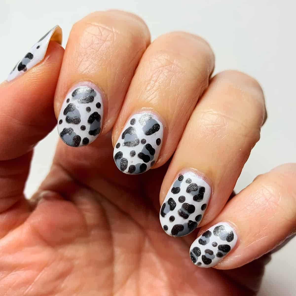 white grey black shimmer short leopard print nails