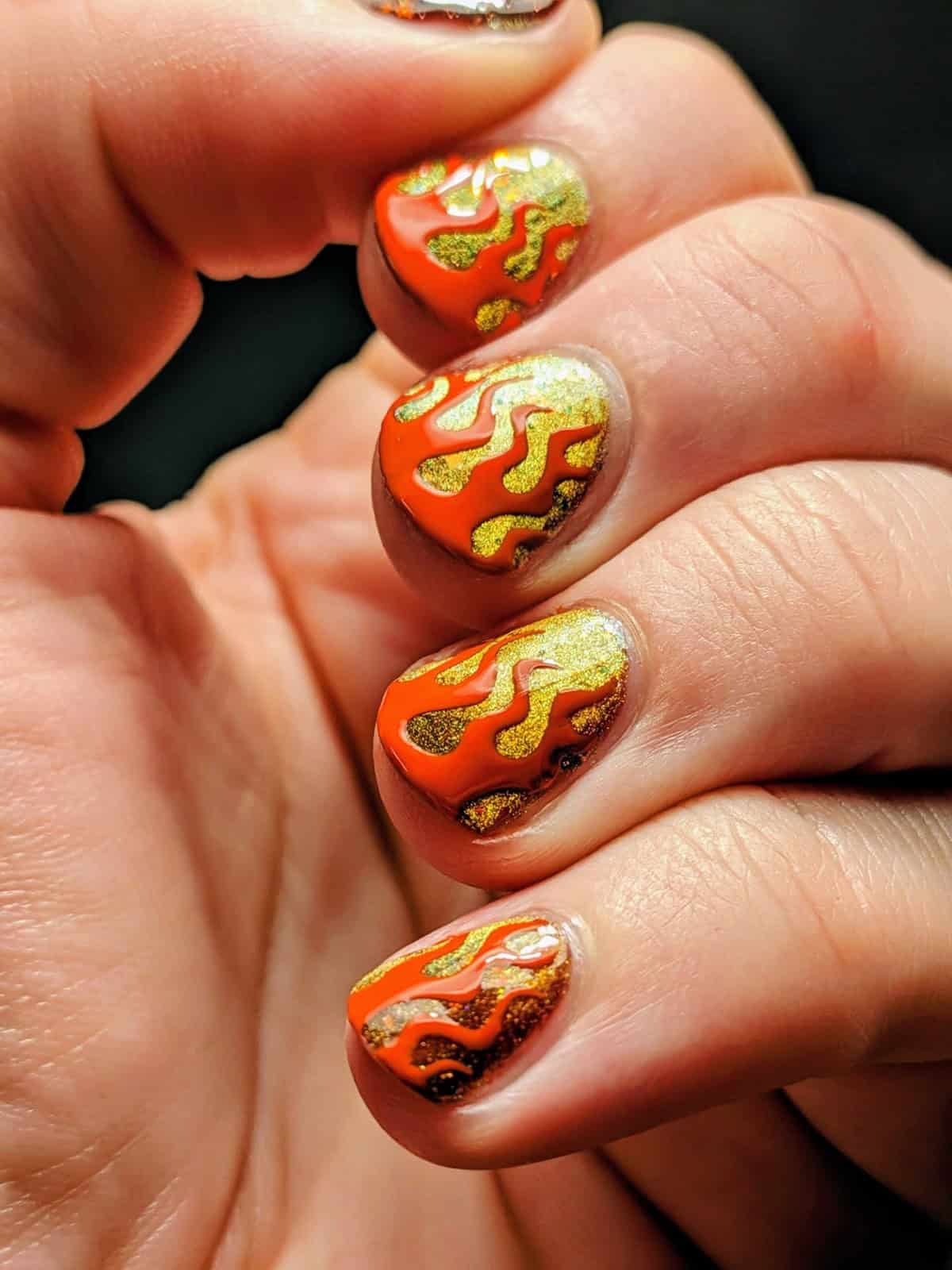 orange gold flame men's nails
