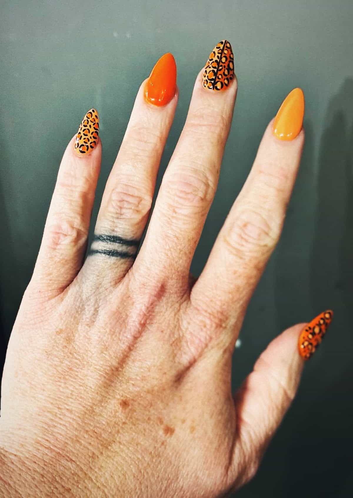burnt orange leopard print nails fall leopard print nails