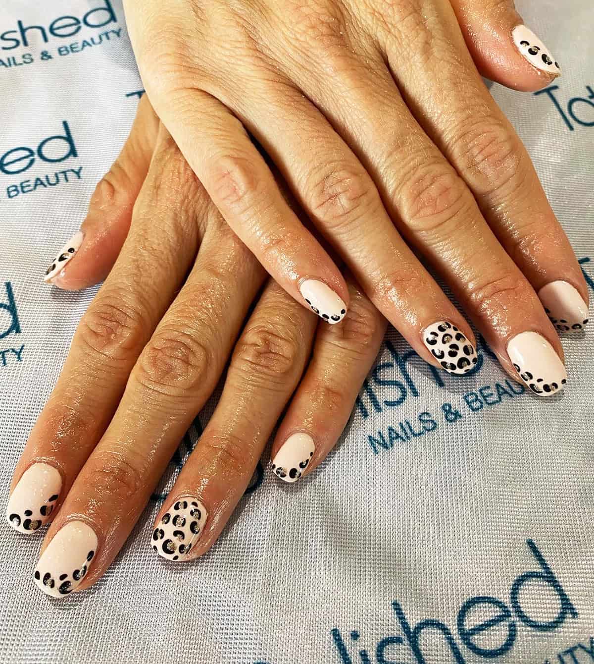 pale nude gold glitter short leopard print nails