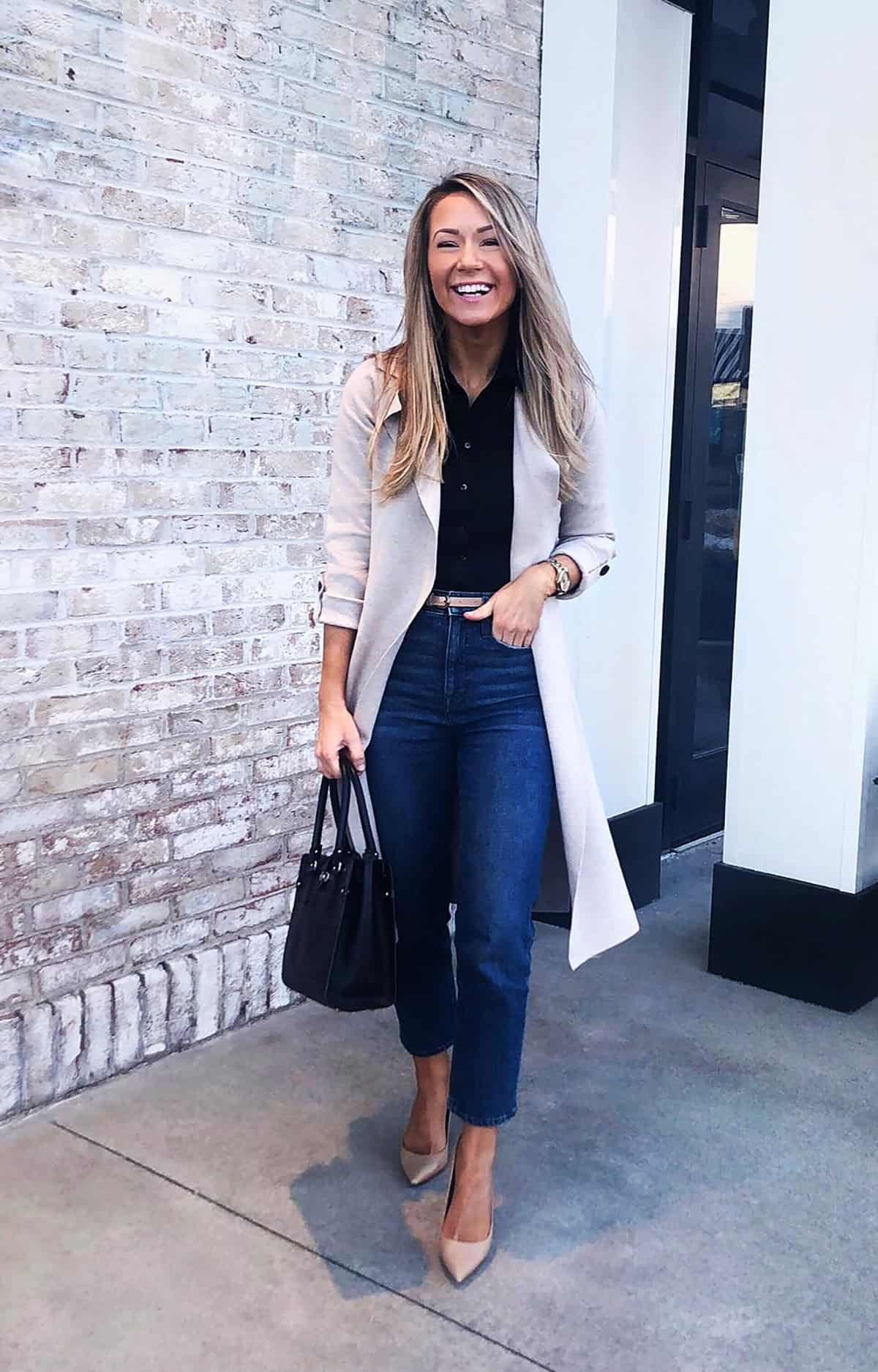 beige coat black shirt dark jeans for casual friday