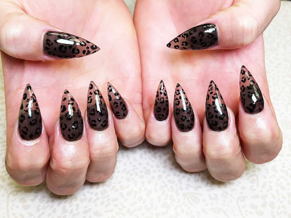 dark glossy stiletto black leopard print nails