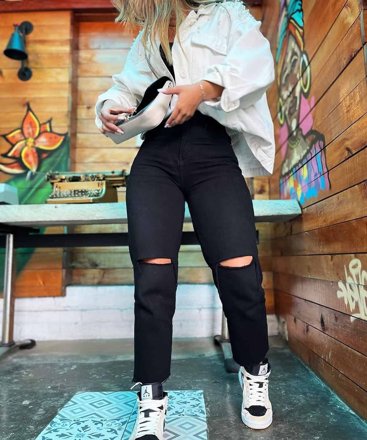white jacket black distressed jeans for moms who need easy outfit ideas