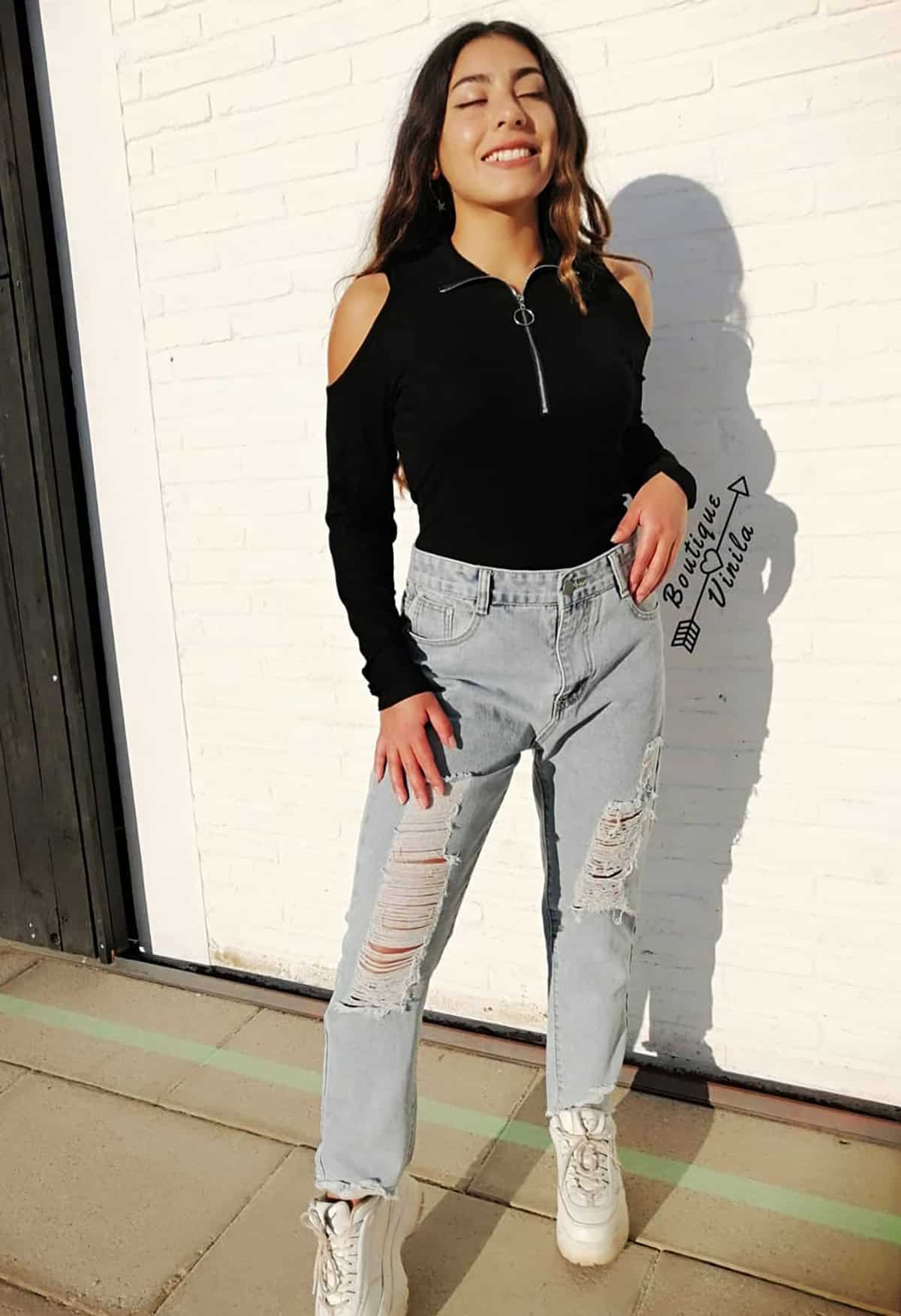black zip top and jeans for moms who need easy outfit ideas