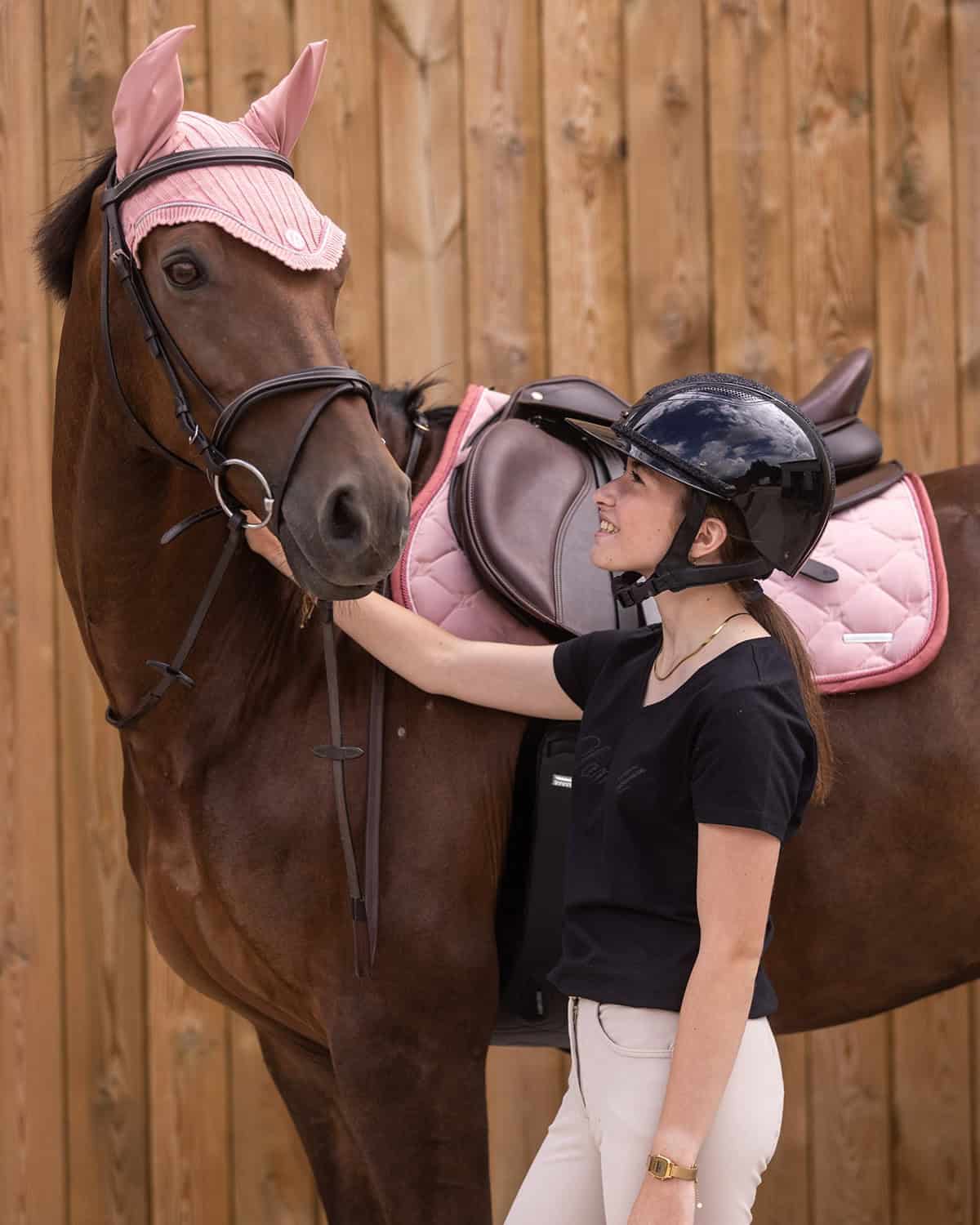 black tee and beige breeches with accents budget equestrian outfit