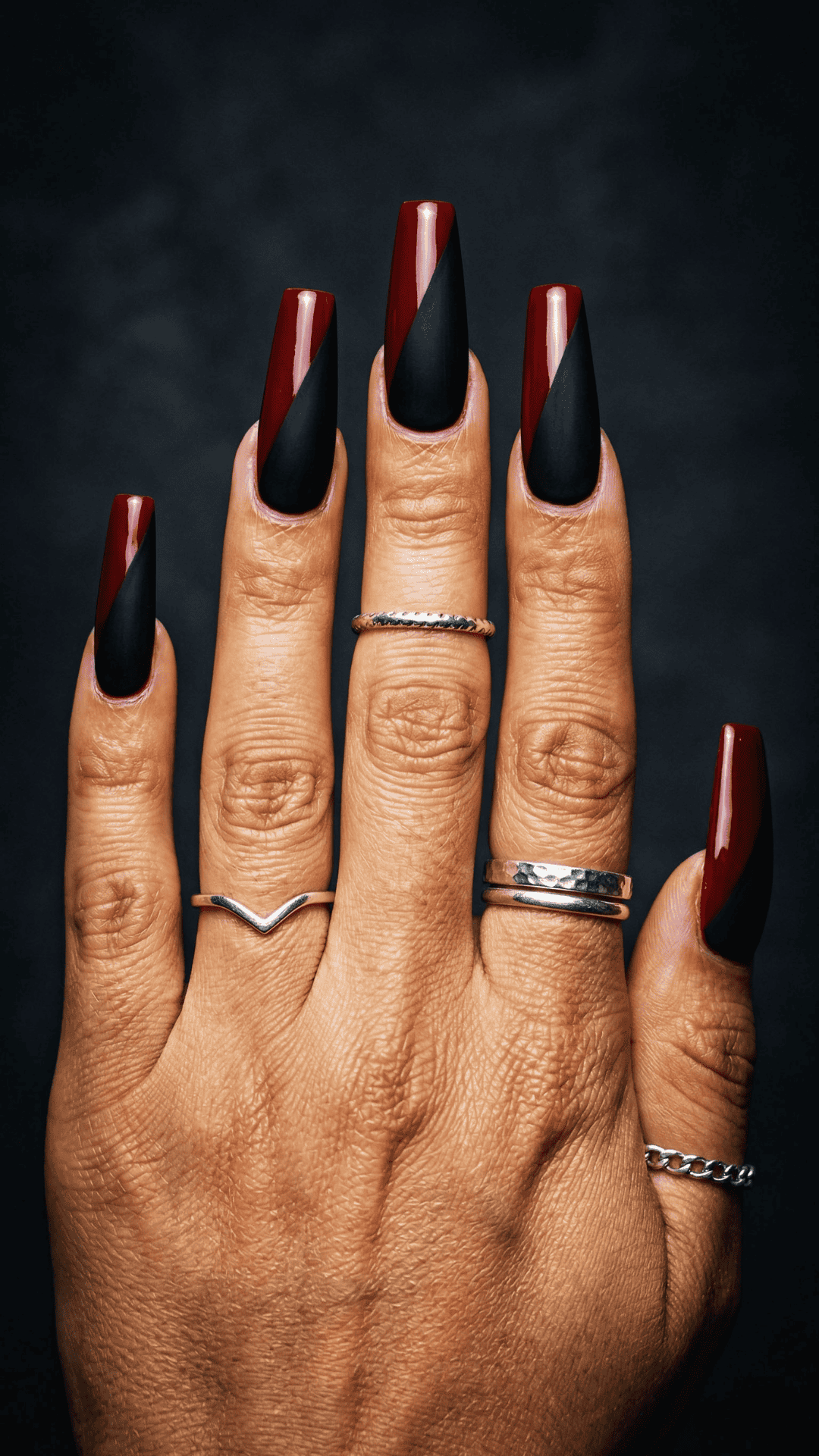 diagonal black and red baddie nails