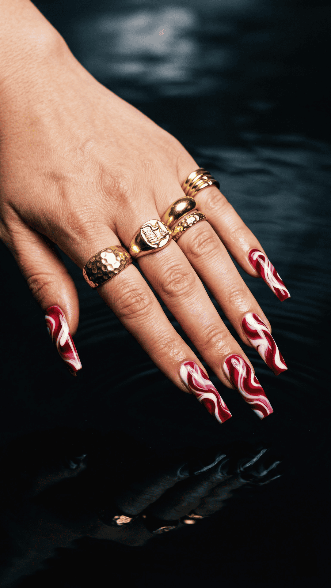 white swirl in red baddie nails