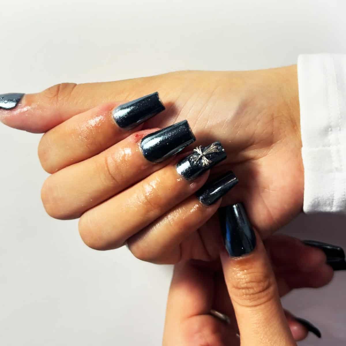 long square black chrome nails with soft shimmer and charm accent black chrome nails