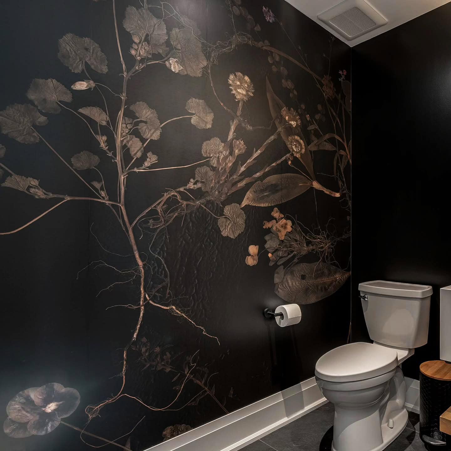 black wallpaper with gold detail