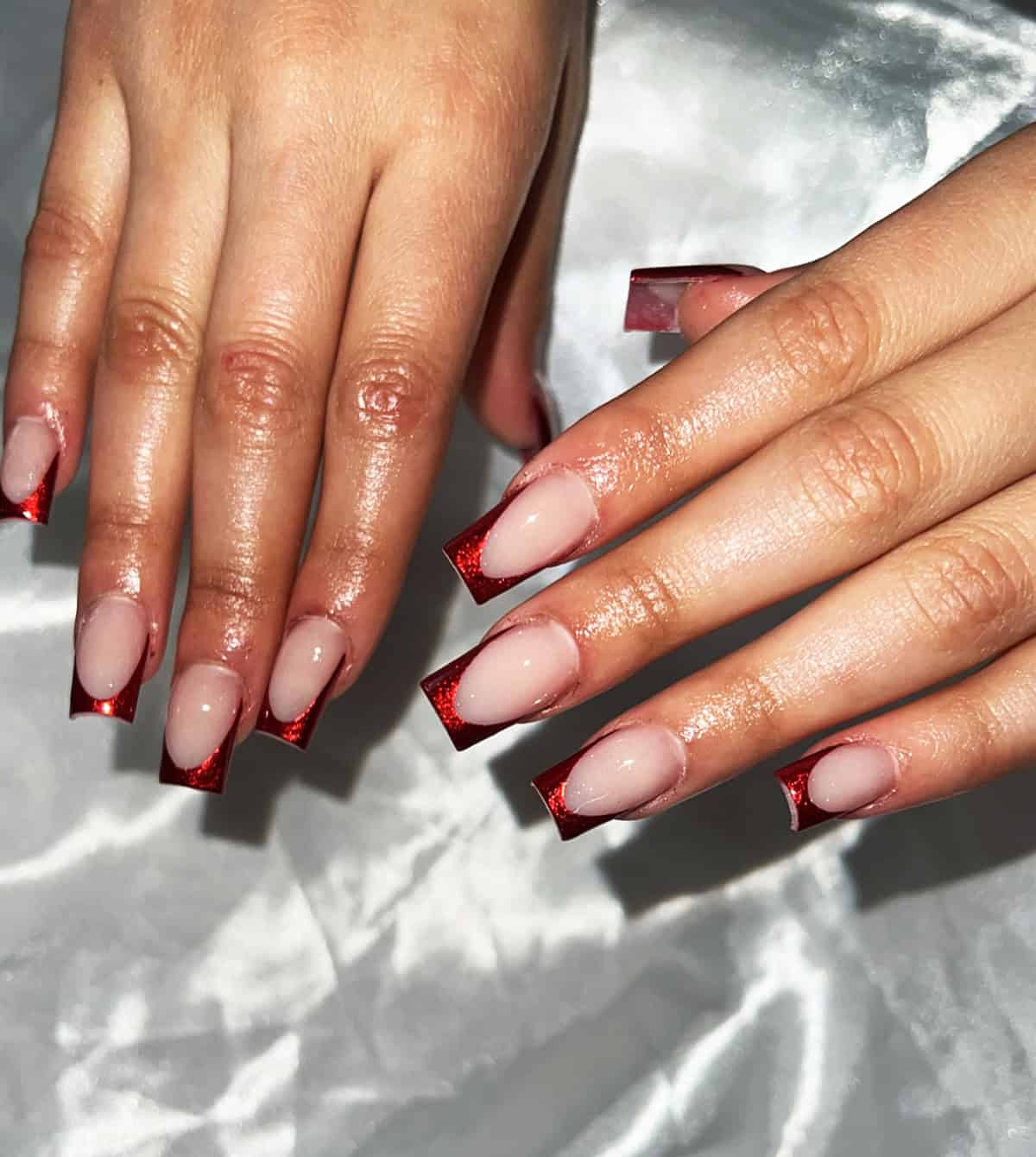 square nude nails with bold red chrome french tips red chrome nails