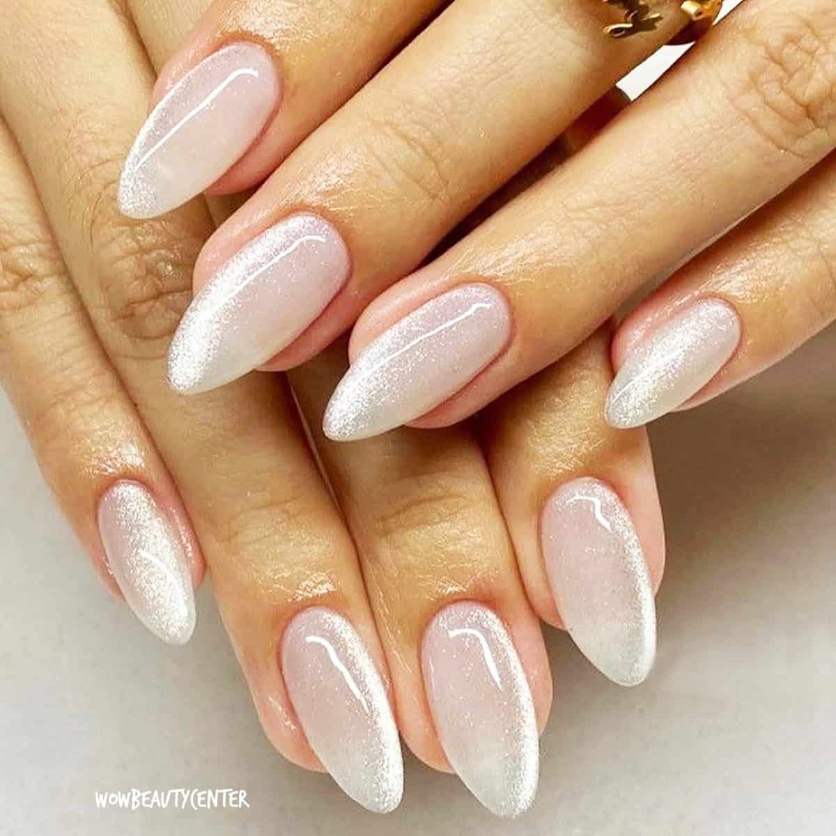  almond nails with sheer white shimmer white chrome nails