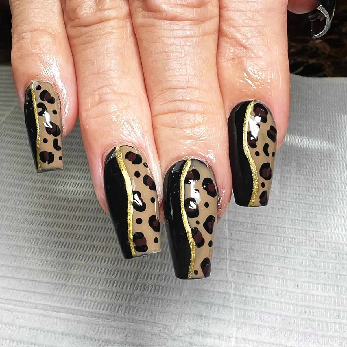 diagonal gold line square black leopard print nails